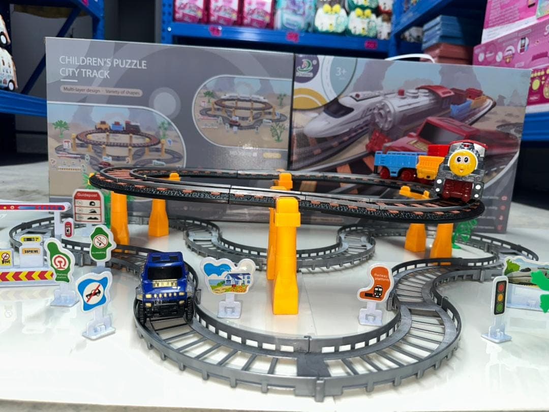 Pista de Rieles Armable "Children's Puzzle City Track" con Tren Motorizado y Carro